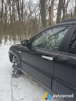 Фото 4 - Kia Sportage 2005