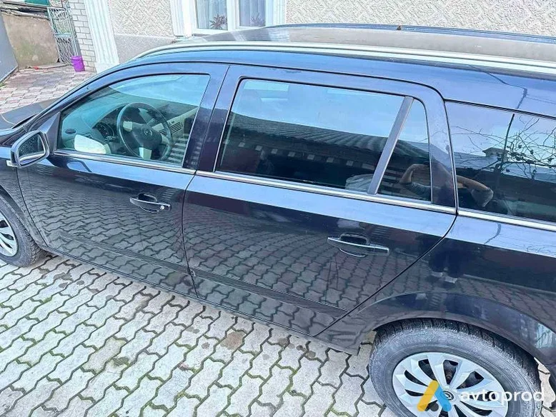 Фото 4 - Opel Astra 2008