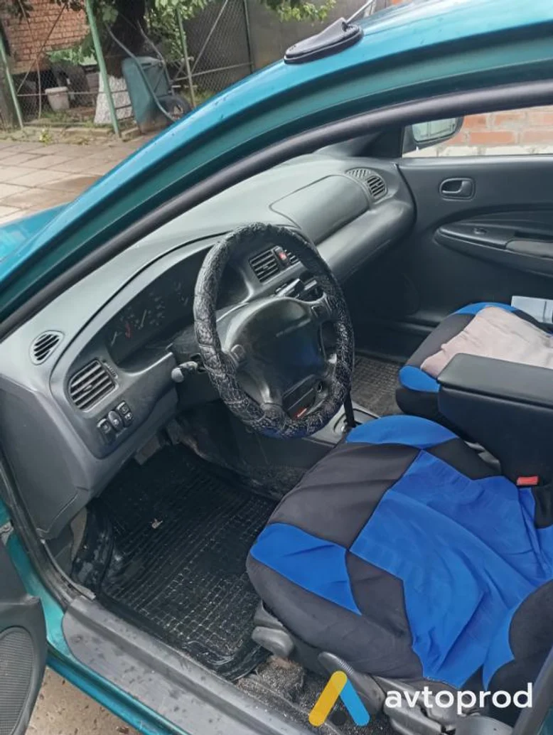 Photo 3 - Mazda 323 1995
