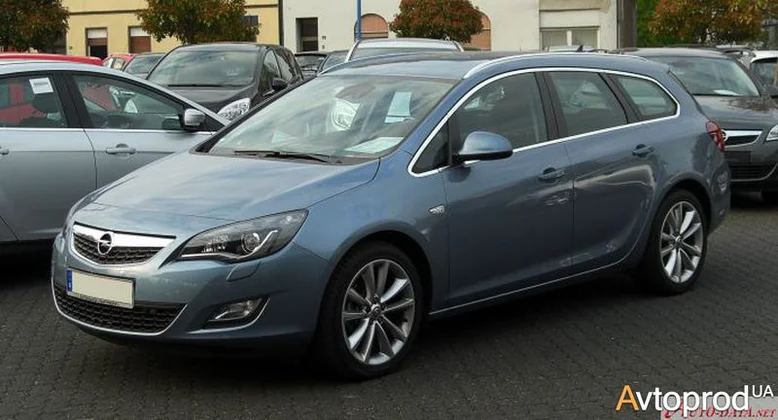 Фото 4 - Opel Astra 2011