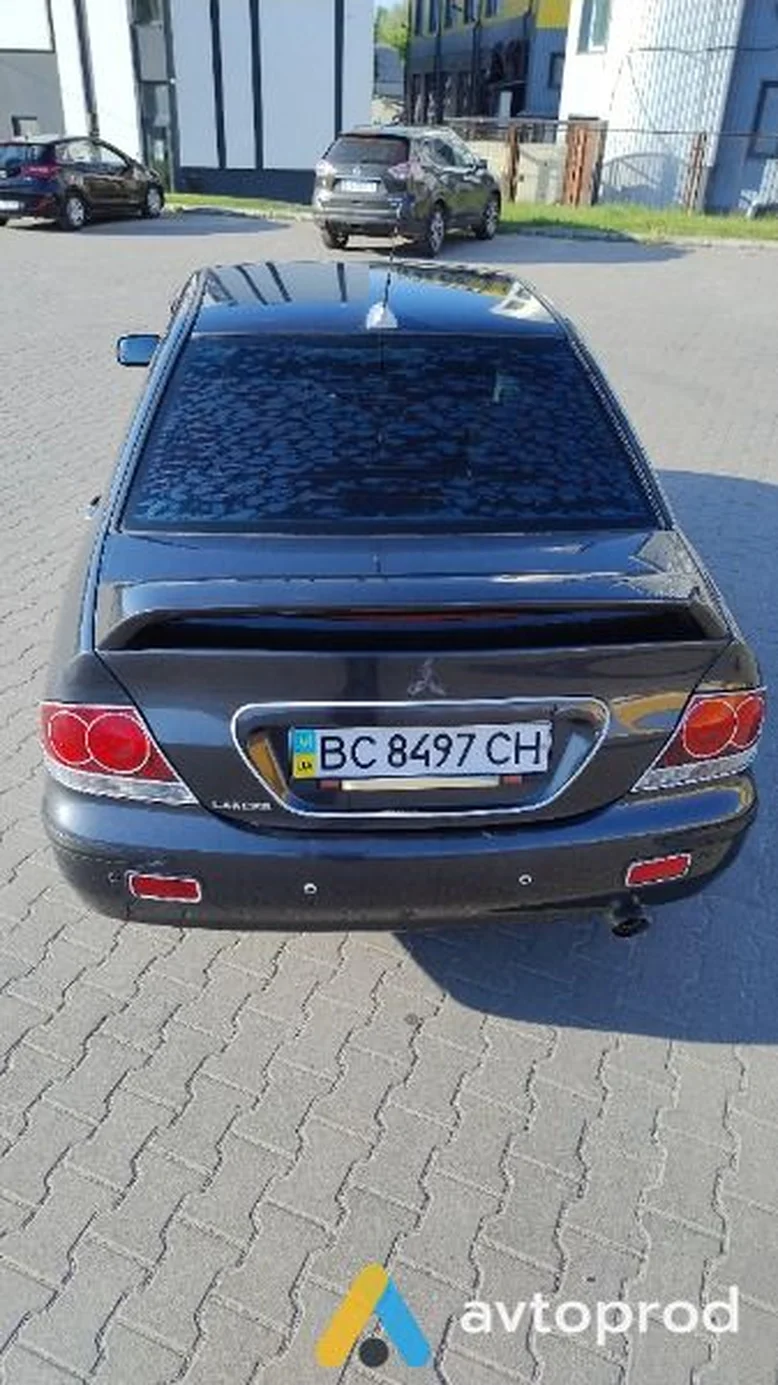 Фото 3 - Mitsubishi Lancer 2004