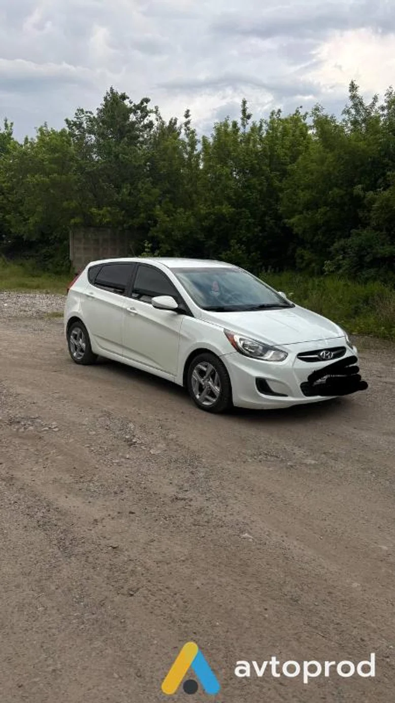 Photo 1 - Hyundai Accent 2014