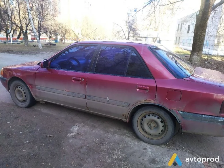 Фото 2 - Mazda 323 1995