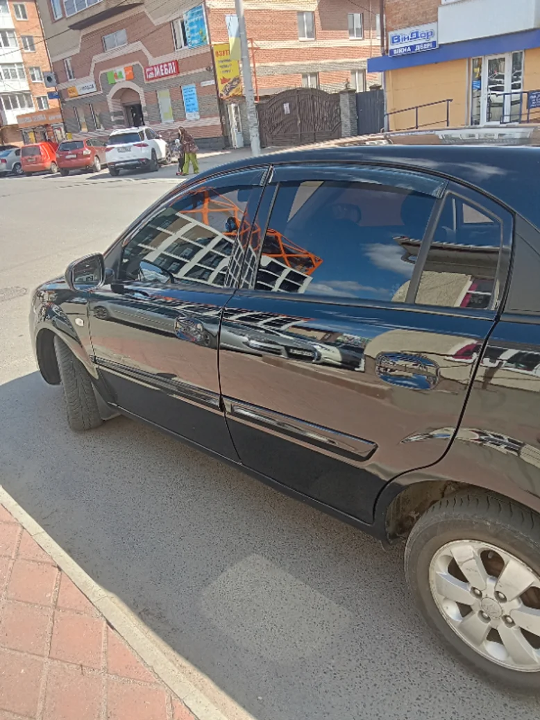 Фото 4 - Kia Rio 2011