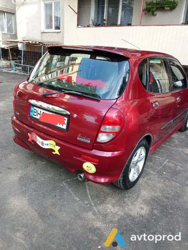 Фото 4 - Daihatsu Sirion 2001