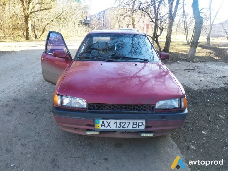 Фото 1 - Mazda 323 1995