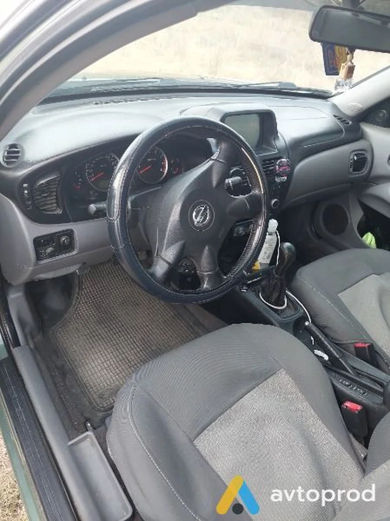 Фото 3 - Nissan Almera 2003