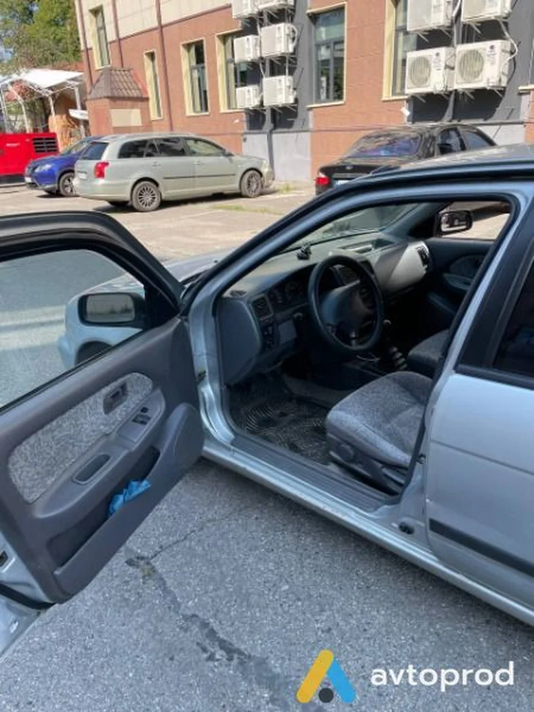 Фото 3 - Nissan Almera 1998