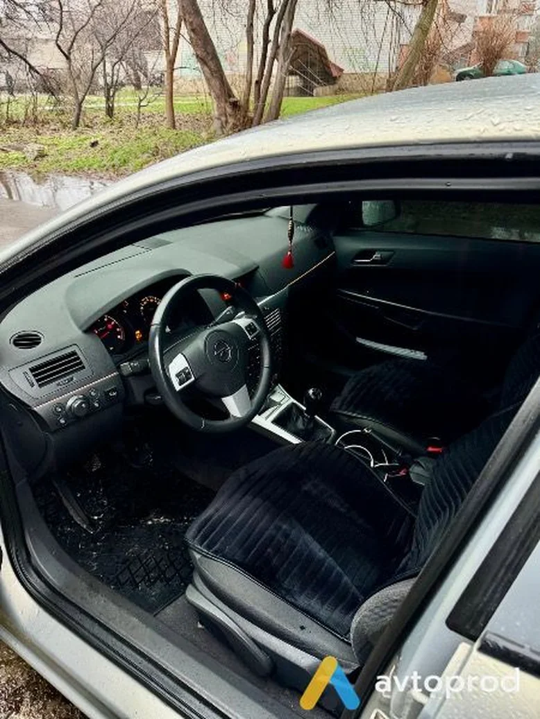 Фото 3 - Opel Astra 2011