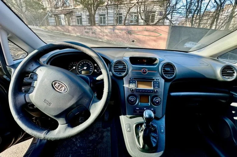 Фото 2 - Kia Carens 2011