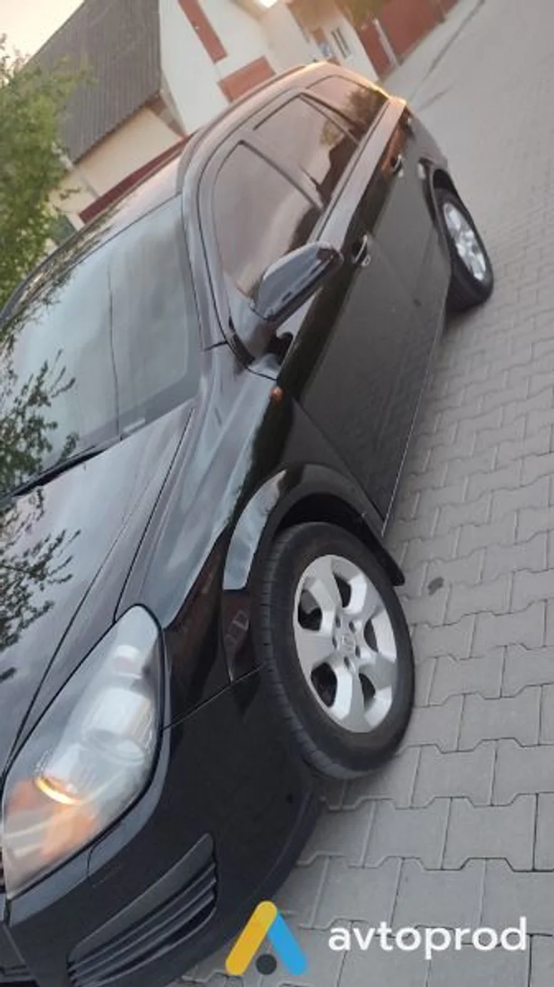 Фото 4 - Opel Astra 2005