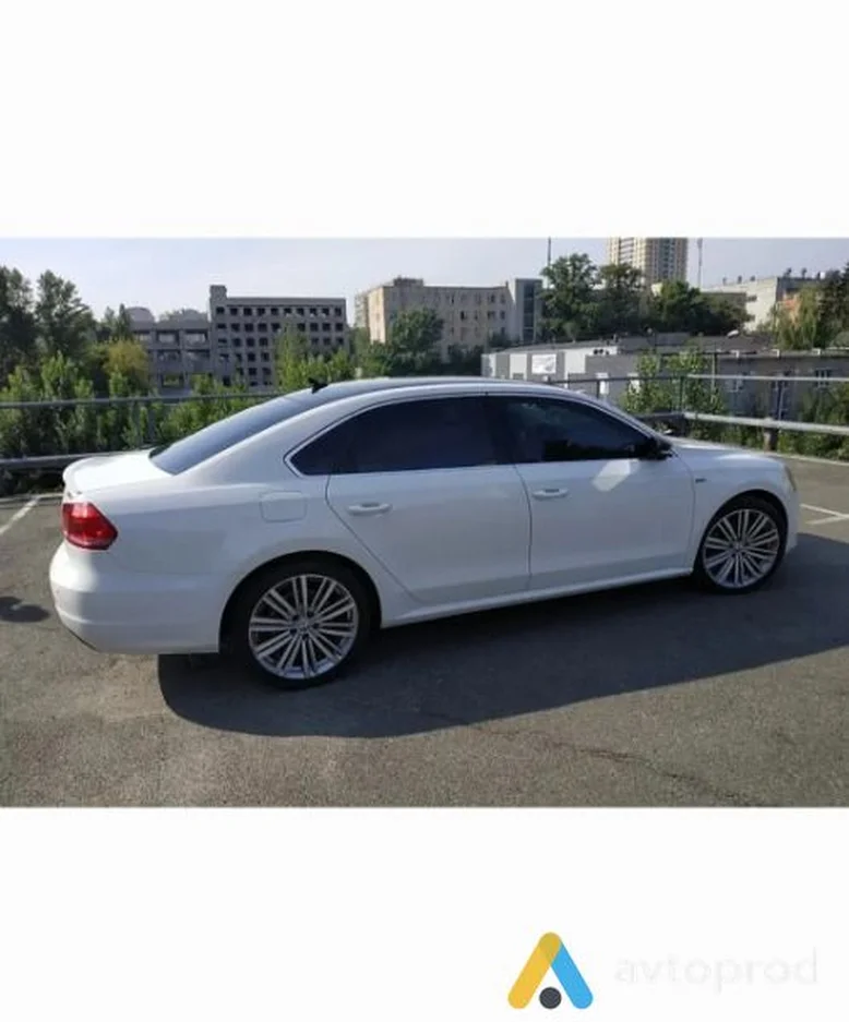 Фото 1 - Volkswagen Passat 2014