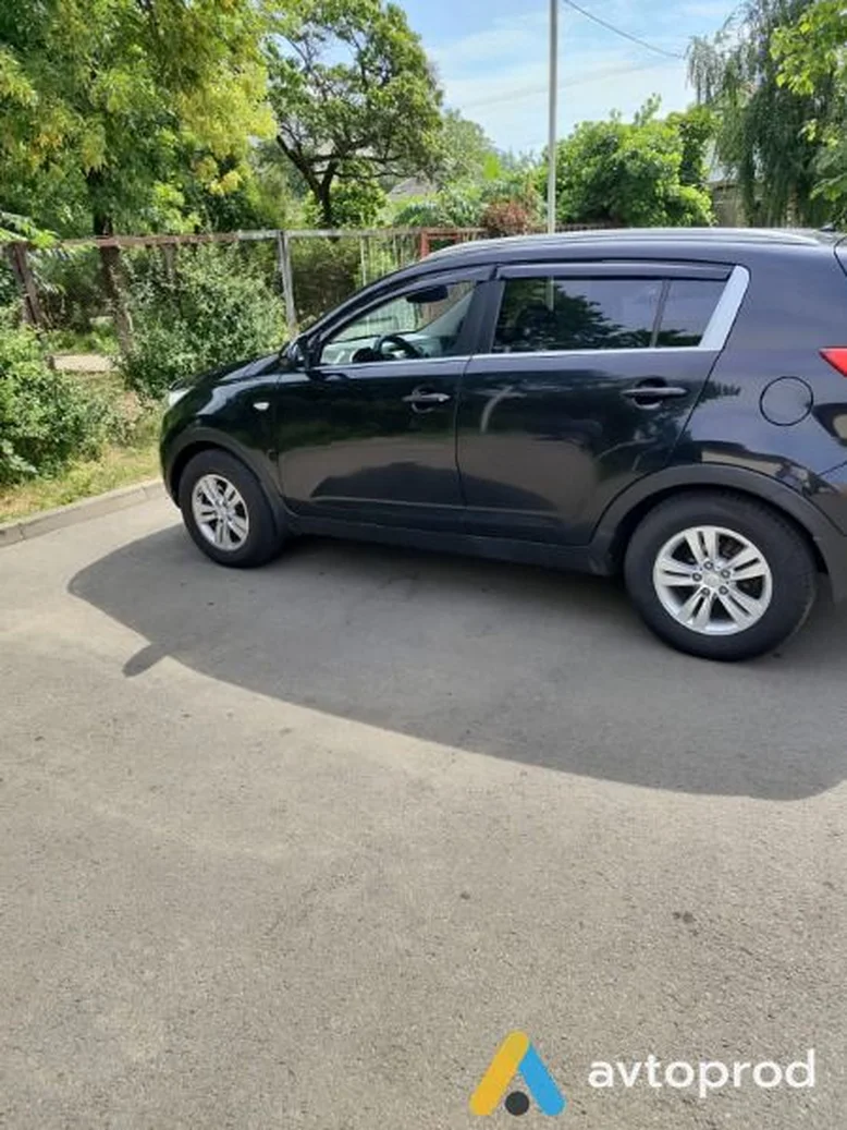 Фото 4 - Kia Sportage 2011